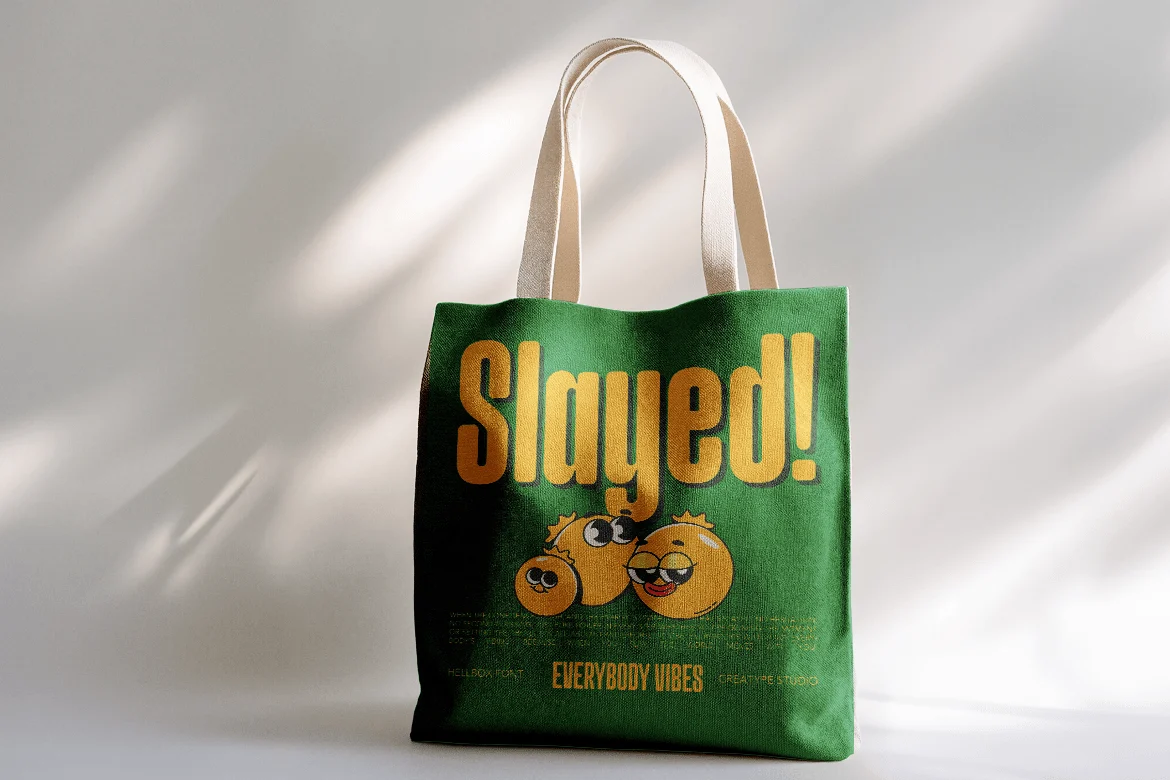 A printed tote bag set in Hellbox